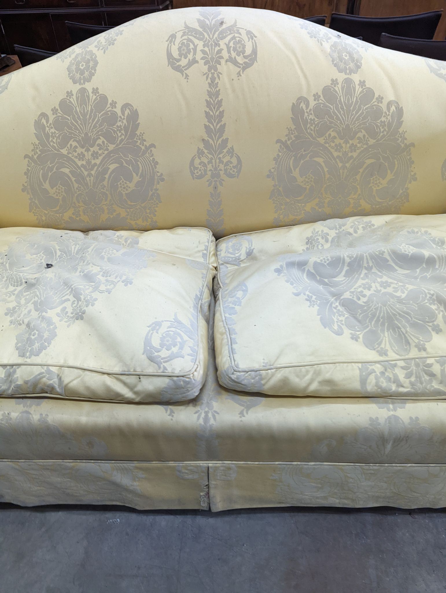 A George III style two seater upholstered scroll arm settee, length 200cm, depth 86cm, height 80cm